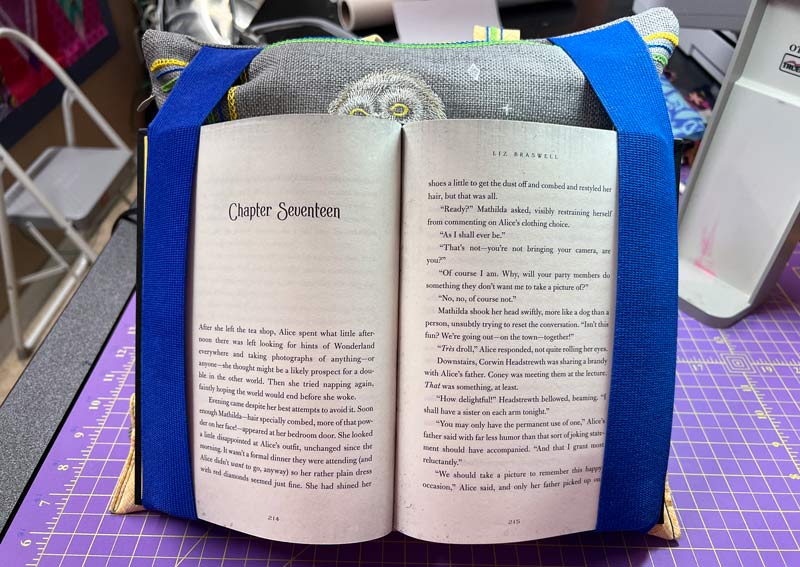 DIY reading pillow finished holding book